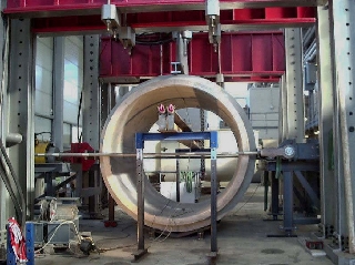 Modified vertical-compression test on large-calibre pipes