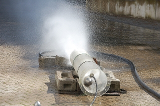 water spraying out of pipe