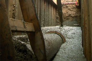 liquid soil being filled in trench