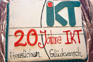 cake with decor 20 years at IKT congratulations