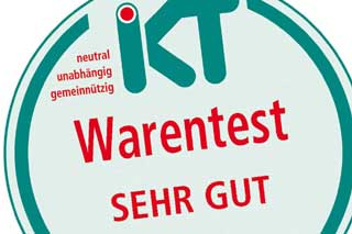 section of IKT compare seal with green and red writing